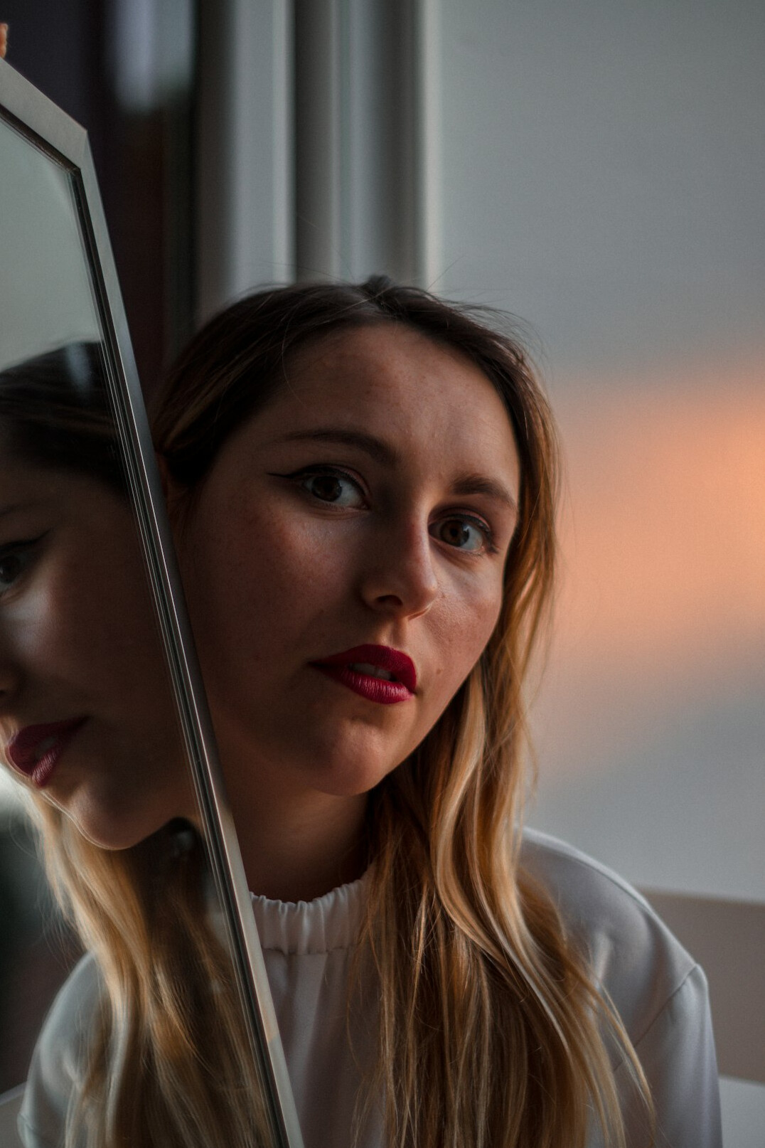 woman practicing speech in mirror