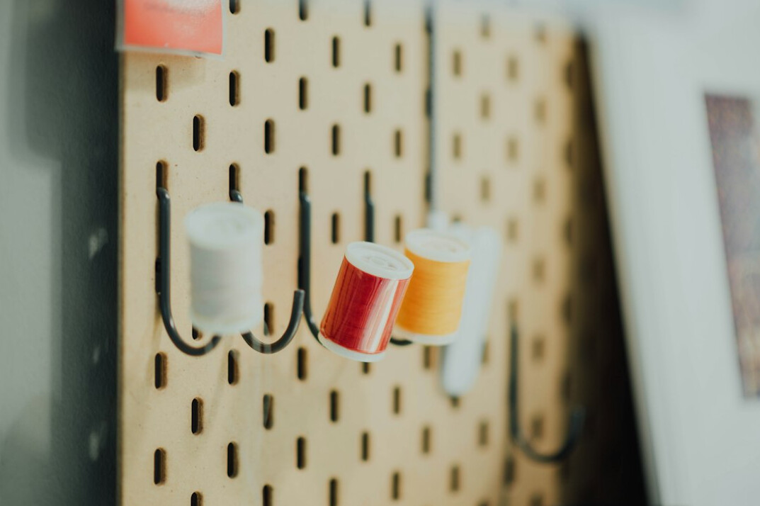 Group of people working together in a workshop with sticky notes